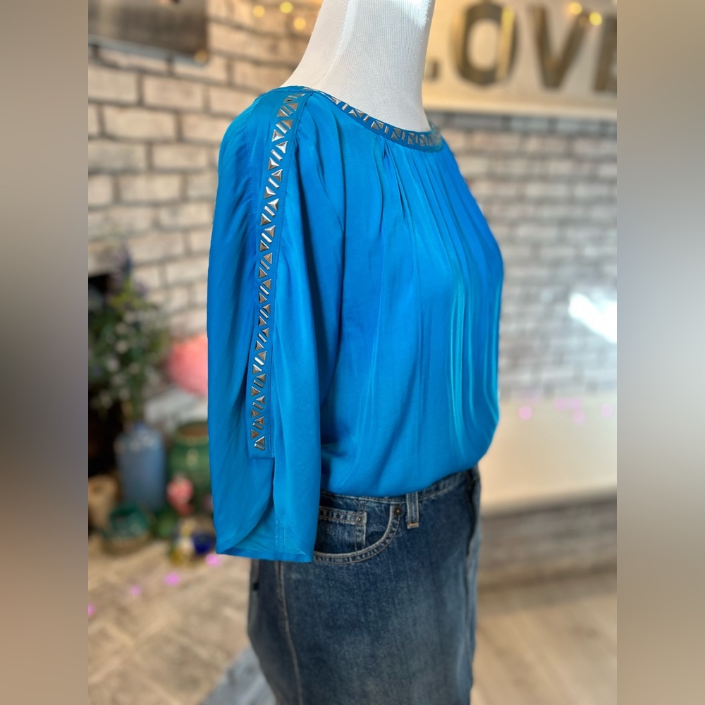 Vince Camero blue silk top with silver stud detailing.